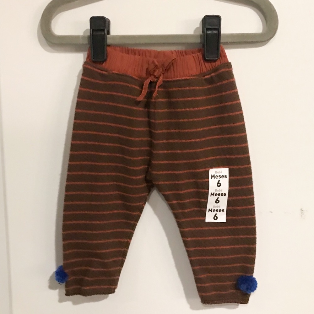 Knit leggings with blue Pom-poms